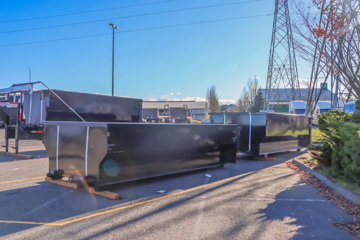Roll-off dumpster ready for waste disposal at job site for 12 Yard Dumpster Rental in Aiken
